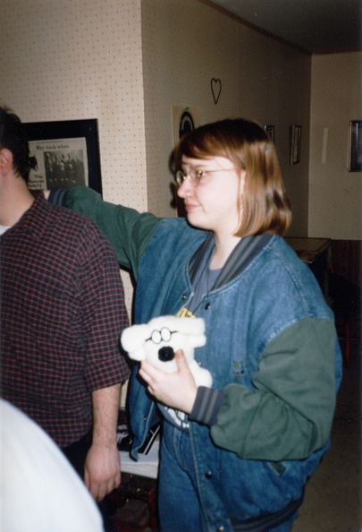 Laurie and Dogbert look on from a safe distance