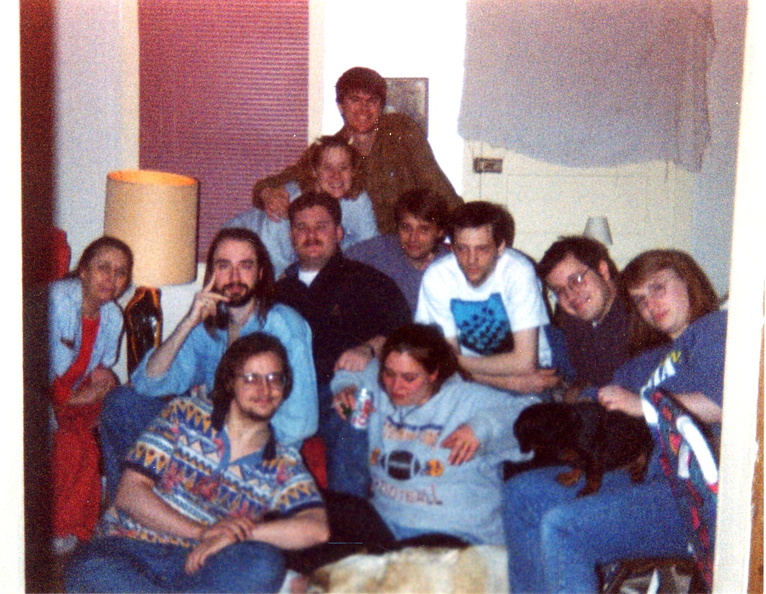 Mark at the top, Shanah and Brad below him. Endo Mark and Dave, with Laurie leaning in.  Mom, Jeff, with Andy below him, Me and Koko in the center.  Heh.  I am the center of the universe.