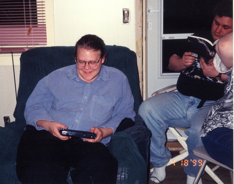 Ian, laughing, while Endo reads.