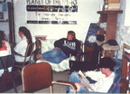 Liza on question computer, JoAnn looking on.  Mark is still keeping that Mag busy.