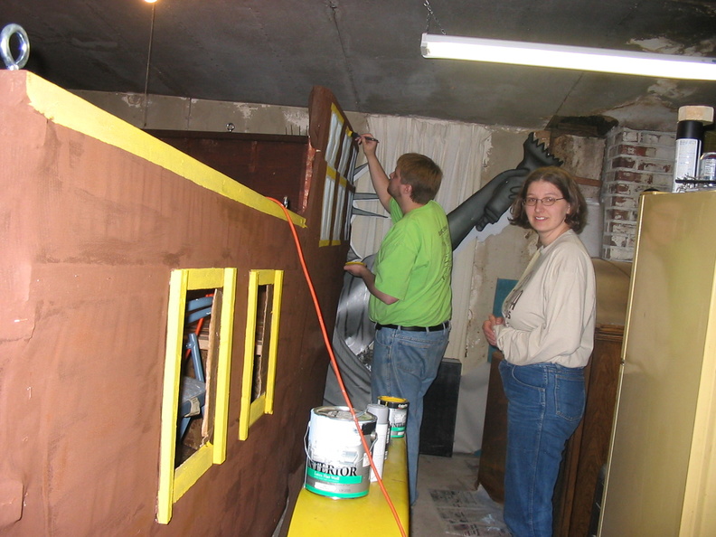 Dawn and Brad working on windows late in the night.