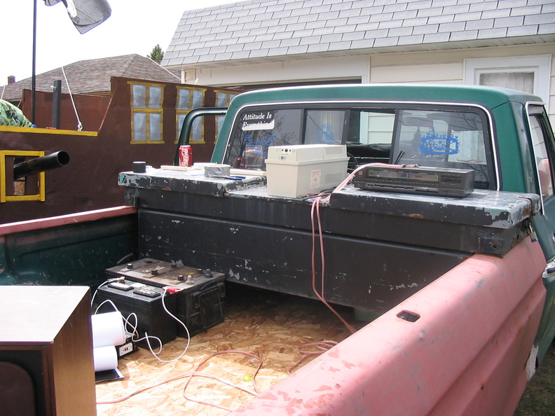 Sound reinforcement. Yes, that's a truck battery.