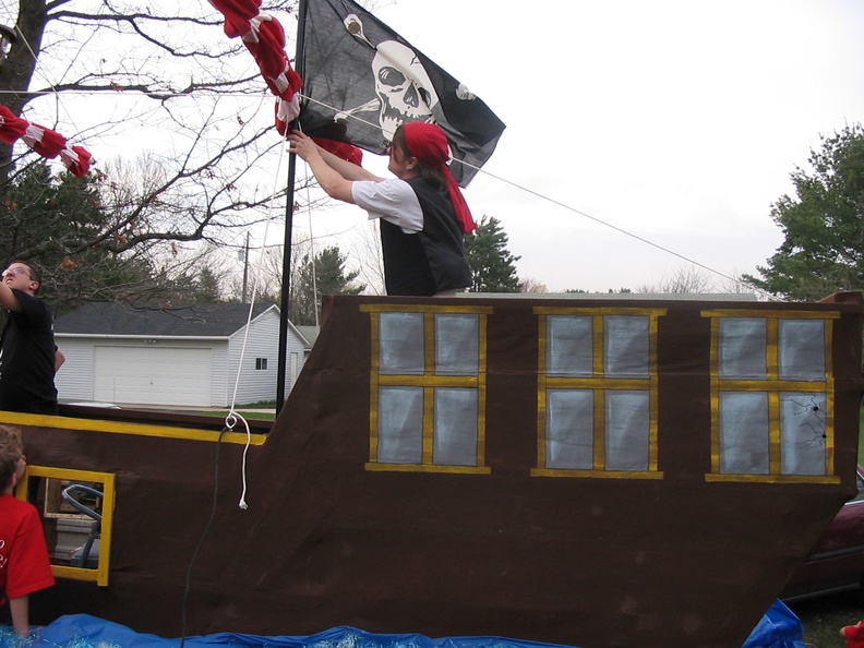 Raising the Jolly Roger for the team picture.