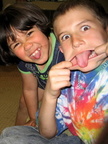 Kayla and Donovan making "funny faces" at Lonnie's request.  (Photo by The Kids)