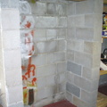 The alcove with the shelves, braces, and bolts removed