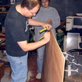 Dale helping me measure the back panel for the shelves