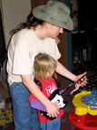 Mark teaching his son how to rock out