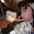 Liza is stitching up a new kilt for Mark to wear