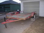 trailer... the rail is welded to the frame, not removeable.