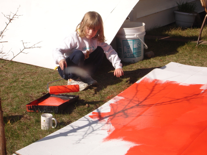 Lonnie helps out with painting the float