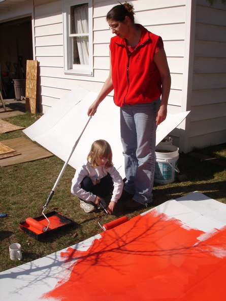 Lonnie helps out with painting the float