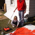Lonnie helps out with painting the float