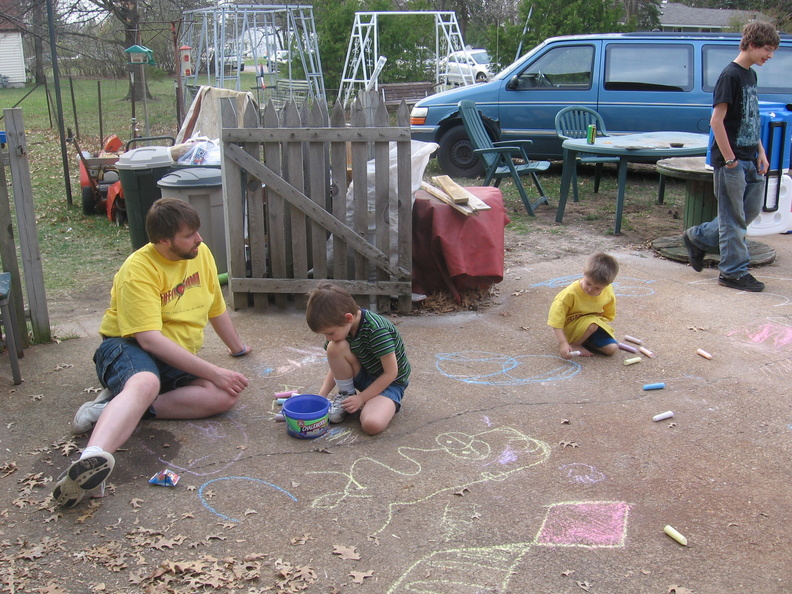 The kids chalk it up to another great trivia, while Brad looks on.