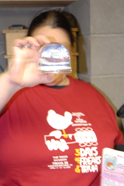 Joyce displaying the snowglobe prize in a very flattering way