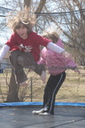 Samantha and Lonnie in mid-jump