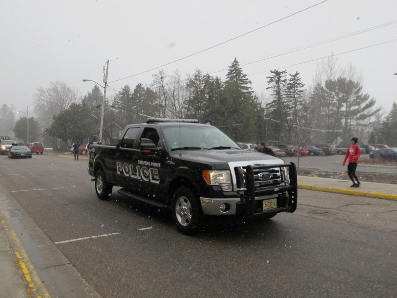 Here comes the parade!  (And the snow.)