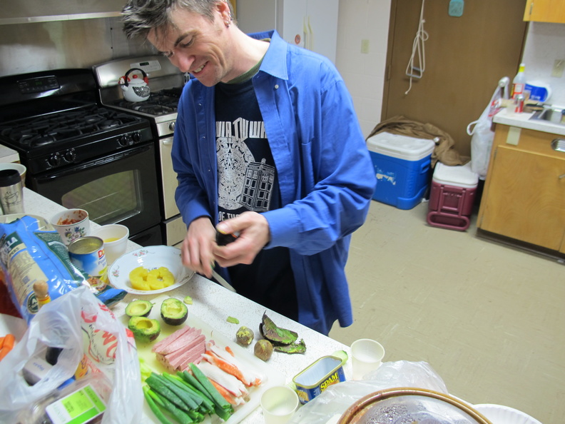 Mark making sushi.  Yummy, yummy, sushi.