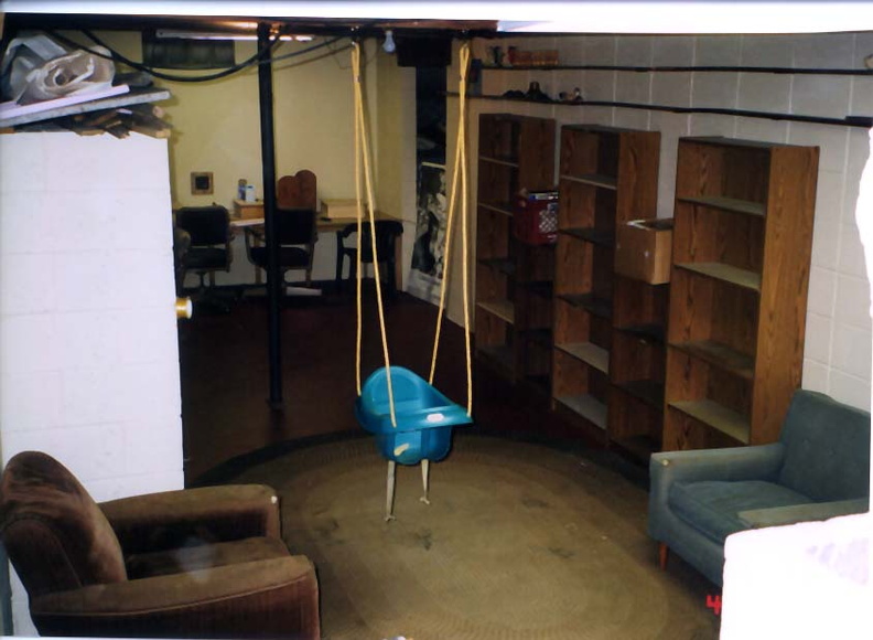 Wondering what the new digs are like? Here's a couple of pictures that Joyce snapped of the basement. They have been doing a LOT of work! (Rumor has it that things already look even better than when these were taken.) triviabasement1.jpg