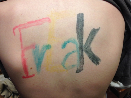 Close-up of Aylins' FrEak tattoo
